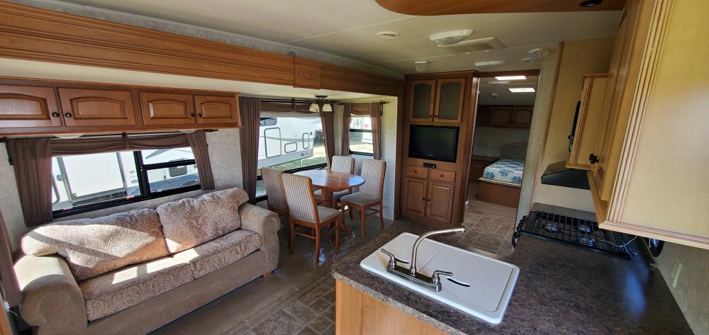 SOLD 2010 Highland Ridge Open Range 287RLS TT Stk #2731